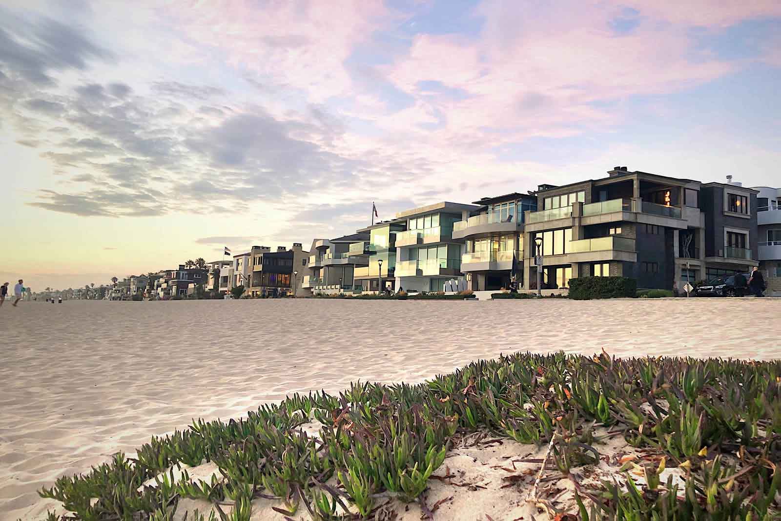 Beachfront homes for sale on the Manhattan Beach Strand background image